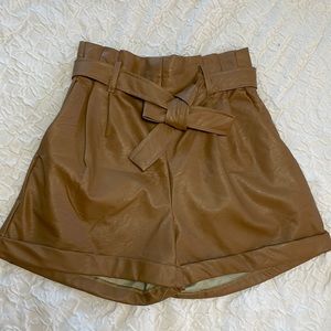 High rise faux leather paper bag shorts